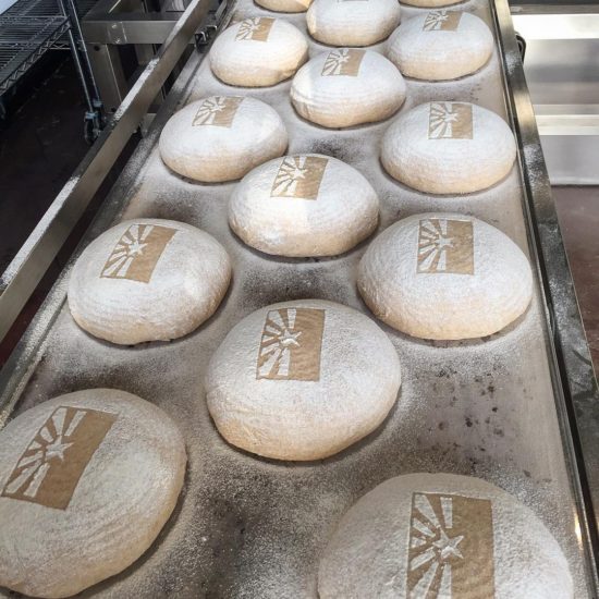 wheat loaves before entering the oven